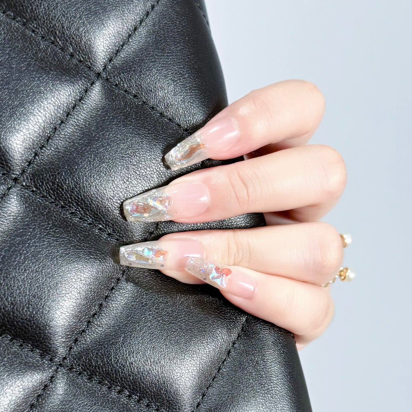 Shining Stars press-on nail with black bag